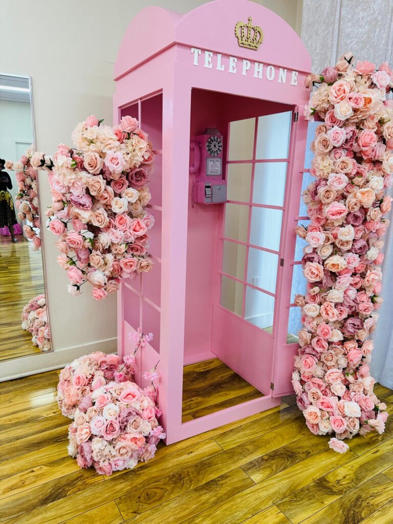 Pink telephone booth photo moment